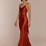 Elegant bridesmaid wearing REWRITTEN Brooklyn Bridesmaid Dress in Burnt Orange