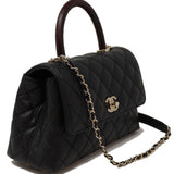 CHANEL Black Quilted Flap Bag with Top Handle