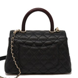 CHANEL Black Quilted Flap Bag with Top Handle