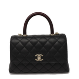 CHANEL Black Quilted Flap Bag with Top Handle