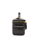 CHANEL Mini Vanity Case in black caviar leather