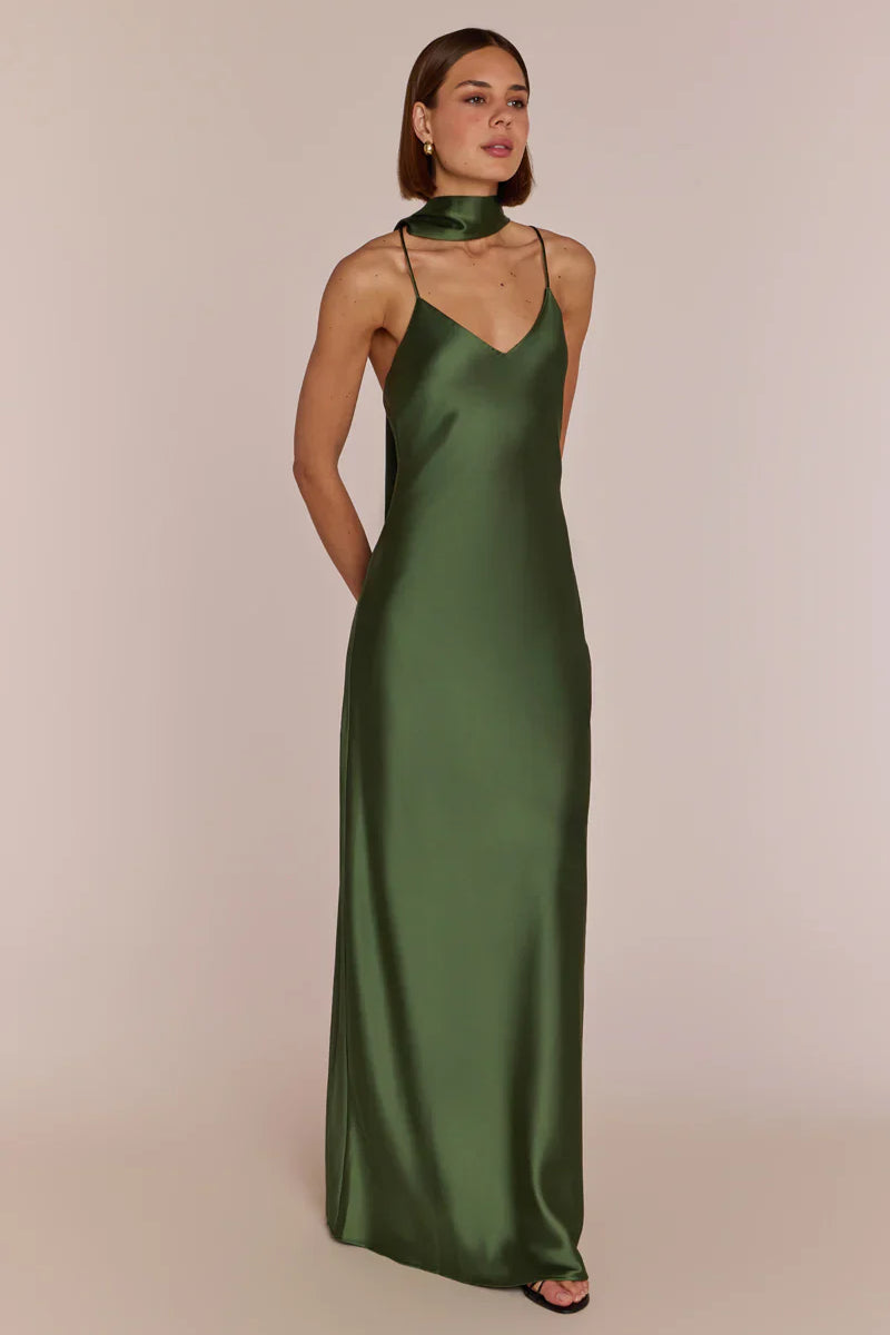 Woman wearing a REWRITTEN Brooklyn Bridesmaid Dress in Olive Green