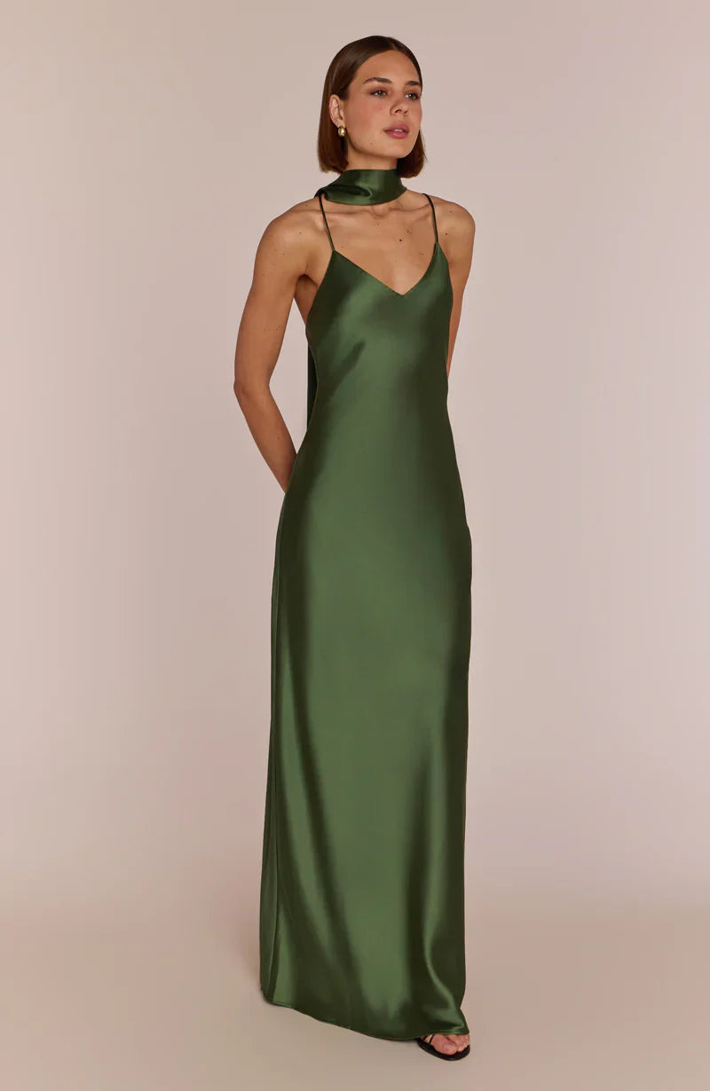 Woman wearing a REWRITTEN Brooklyn Bridesmaid Dress in Olive Green