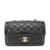 CHANEL Special edition mini flap in black with patent trim