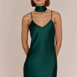 women model in Brooklyn-strappy-slip-satin-bridesmaids-occasion-dress-dark-forest-green