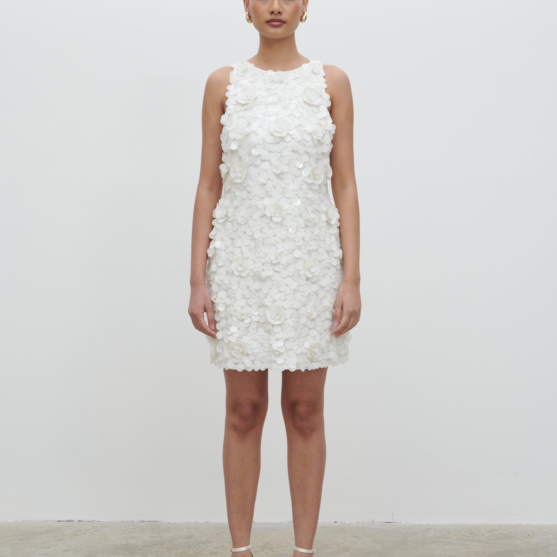 Arles rosette sequin mini dress, available to rent at Something Borrowed