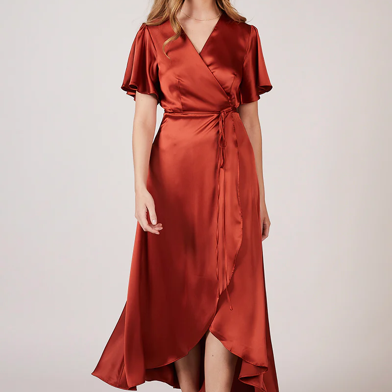 Florence Waterfall Bridesmaid Dress in burnt orange, available to rent at Something Borrowed