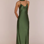 Woman wearing a REWRITTEN Brooklyn Bridesmaid Dress in Olive Green