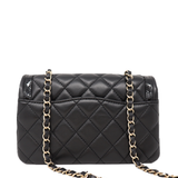 CHANEL Special edition mini flap in black with patent trim