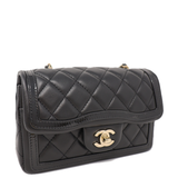 CHANEL Special edition mini flap in black with patent trim