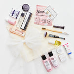 Collection of skincare and makeup products on a light background