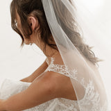 OUI The Label One Tier Veil in natural white, worn at the back of the head