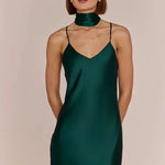 women model in Brooklyn-strappy-slip-satin-bridesmaids-occasion-dress-dark-forest-green